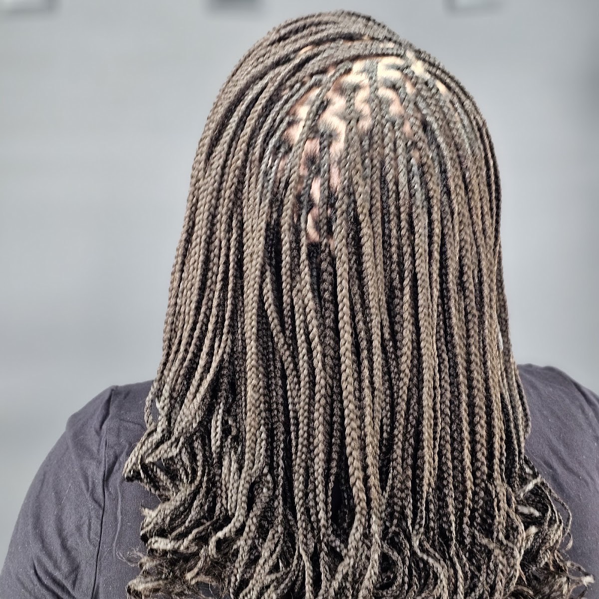 Long knotless braids flowing past the shoulders