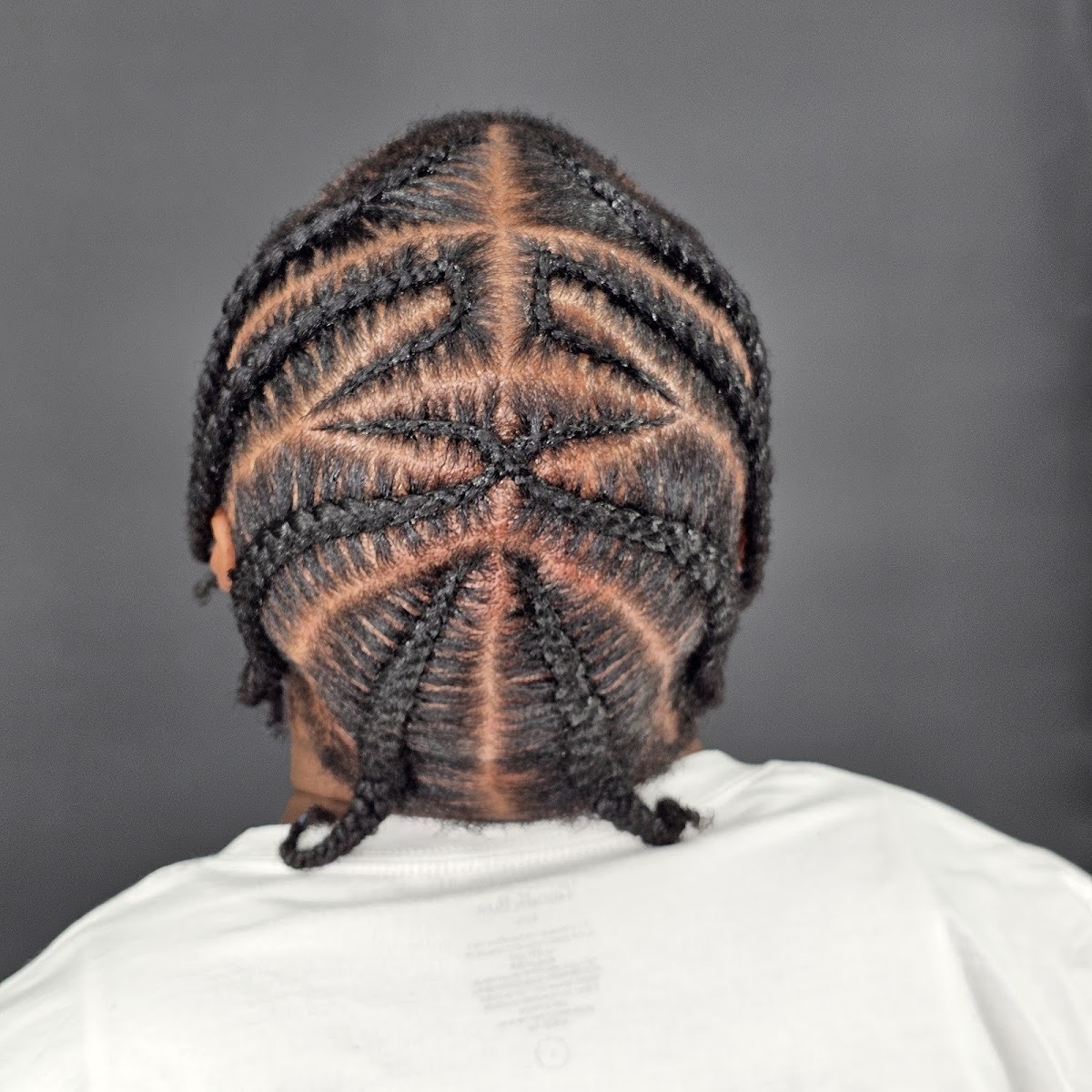 Detailed cornrow design braided into a neat pattern